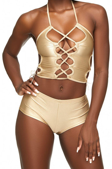 Top corto de rejilla con aberturas color nude